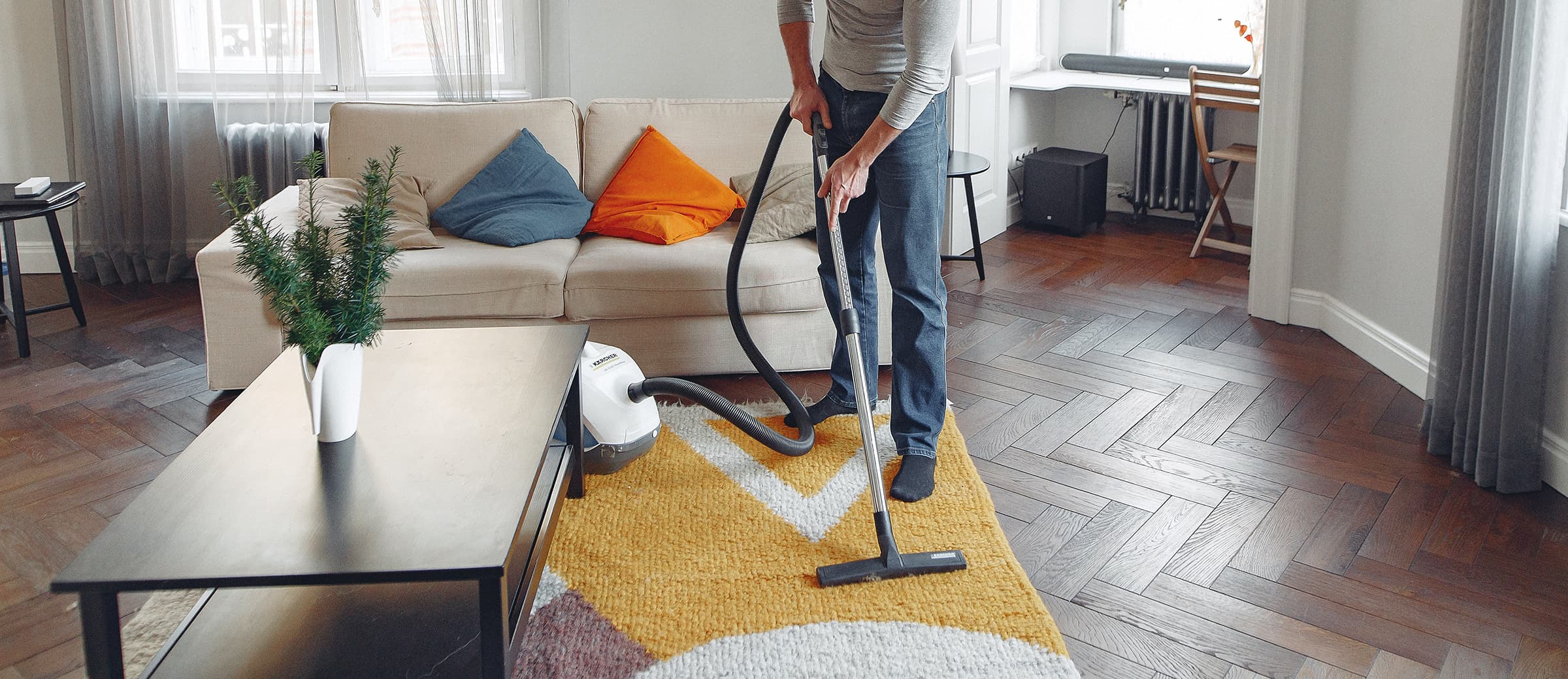 Photo Of Man Cleaning The Carpet