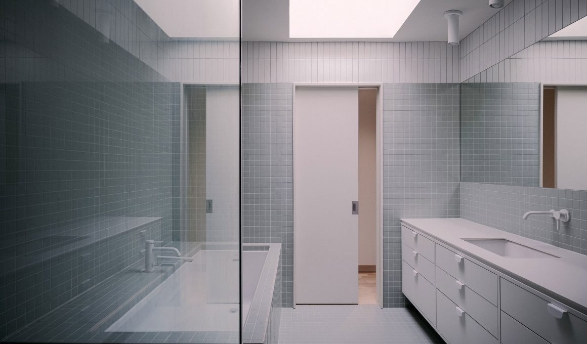 How To Use Vertical Shower Tiles To Maximize Small Bathroom Spaces