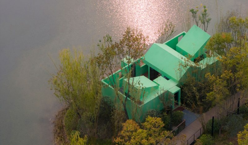 Bold Green Retreat Cabin Nestled on a Remote Islet in a Chinese Lake